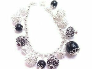 Bracciale su coccu e bottoni sardi in filigrana sarda