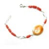 Occhio Di Santa Lucia bracelet with natural coral