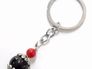 Su Coccu lucky charm keyring in coral steel