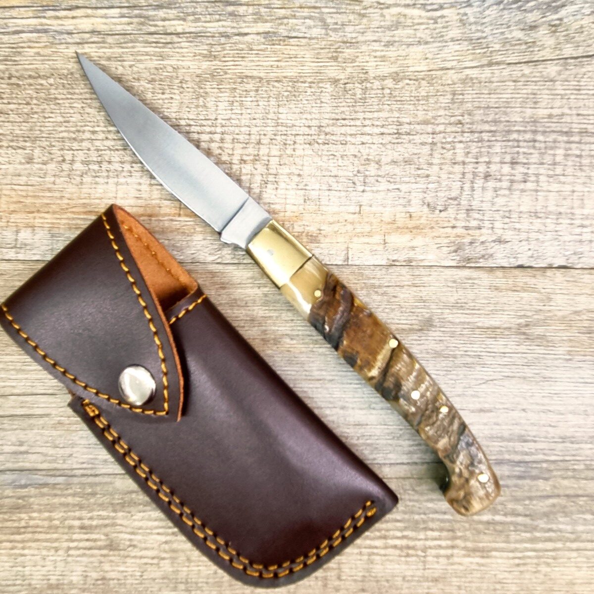 Coltello fatto a mano tipo pattada manico in corno di montone grezzo con fodero (23,5cm)